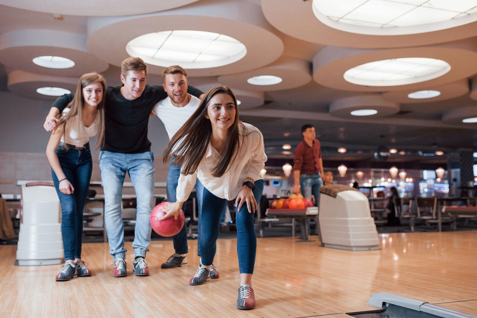 Excited group cheering at the lanes